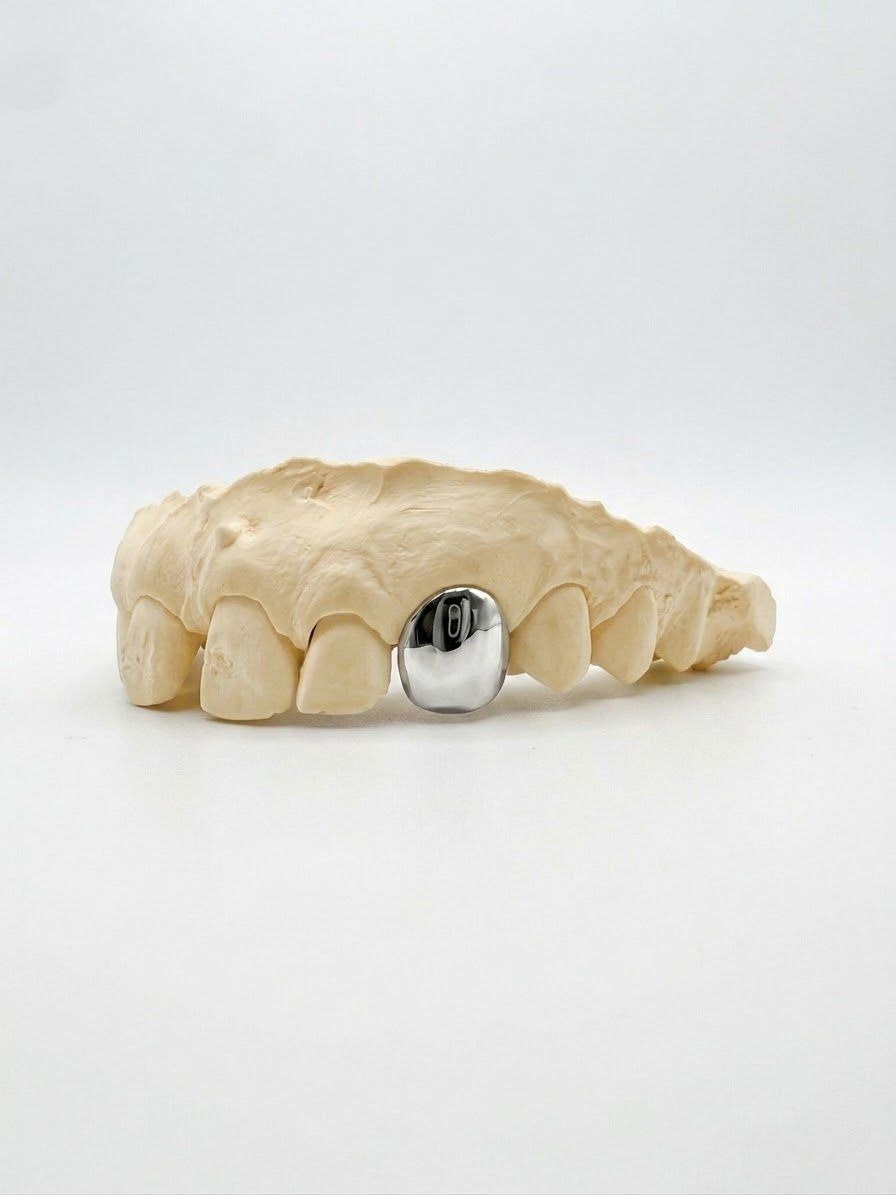 Dent unique — cap argent